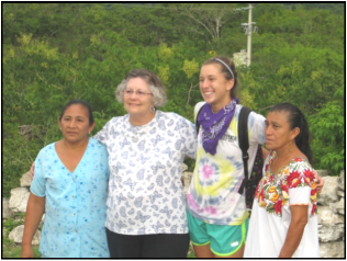 My roommate Leslie and me with our hosts