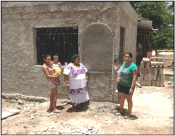 The family we worked for and the completed house