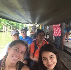 Shopping The Floating Market—you ride a boat from shop to shop
